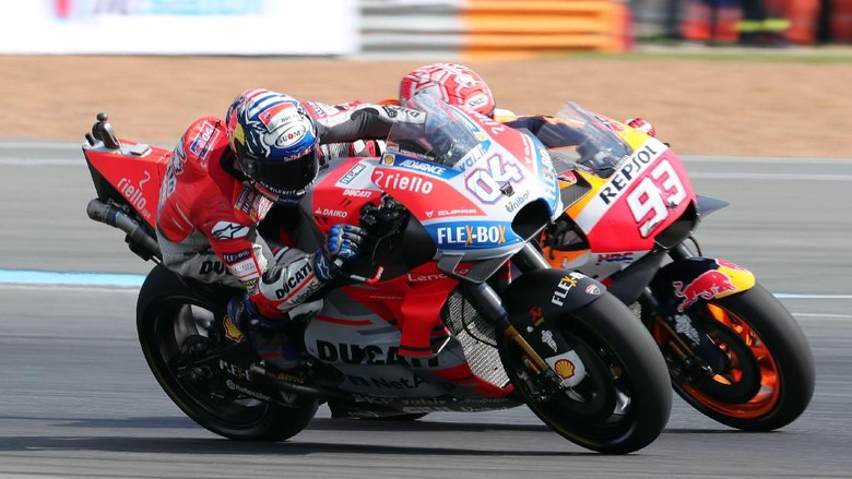 Duel seru antara Marc Marquez dan Andrea Dovizioso di balapan MotoGP Thailand, Minggu (6/10) siang