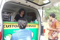 BPJS Kesehatan Cabang Maumere sedang melayani warga masyarakat Kecamatan Doreng melalui fasilitas layanan mobile customer service pada pertengahan Juni 2019 lalu