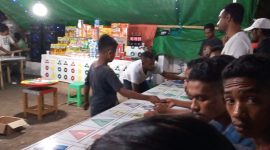Seorang anak di bawah umur terlibat nembantu bandar rolet pada pasar malam di Lapangan Umum Kota Baru, Minggu (1/12)