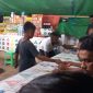 Seorang anak di bawah umur terlibat nembantu bandar rolet pada pasar malam di Lapangan Umum Kota Baru, Minggu (1/12)