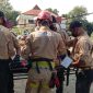 Sejumlah personil Tagana melakukan simulasi di Gedung SCC, Kamis (24/6) dalam rangka peningkatan kompetensi (foto: istimewa)