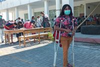 Maria Norma Yunita usai mendaftarkan diri untuk mendapatkan pelayanan vaksinasi gratis, Senin (5/7)