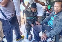 Terduga pelaku pembunuhan (terikat tali) diamankan Tim Lidik Gabungan (foto: istimewa)