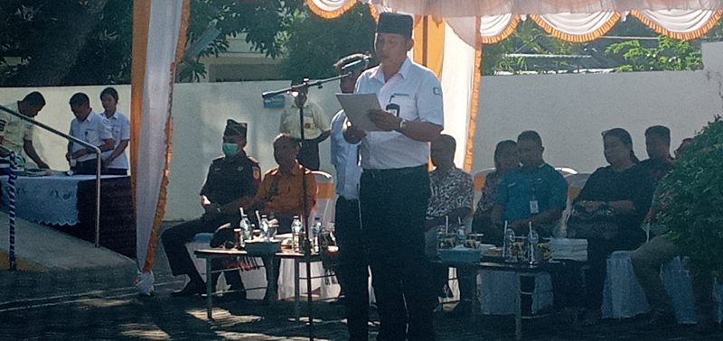 Kepala BPJS Kesehatan Cabang Maumere I Gusti Ngurah Arie Mayanugraha membacakan pidato kelembagaan Dirut BPJS Kesehatan 