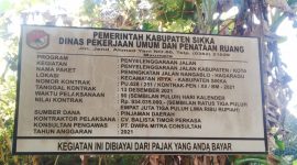 Papan informasi proyek Peningkatan Jalan Nangablo-Hagarahu