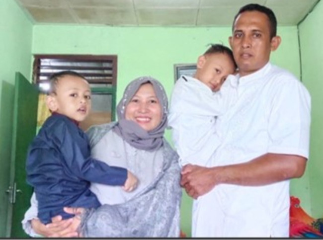 Sri Indriani bersama suami dan dua anak mereka telah menjadi peserta JKN