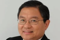 Charlie Paulus, Dirut Bank NTT