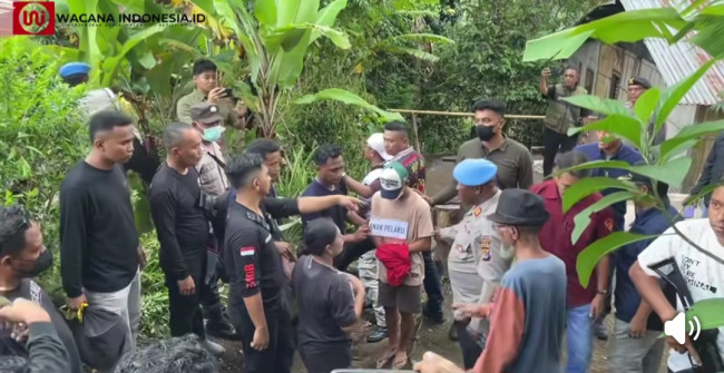 Suasana saat rekonstruksi kasus 
pembunuhan di Rubit 