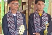 Christian Julio Badar dari Jurusan Desain Komunikasi Visual, dan Longginus Nong Ariel dari Jurusan Teknik Komputer dan Jaringan, duta prestasi SMKS Yohanes XXIII Maumere 